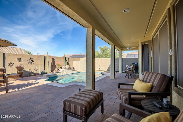 view of patio featuring a fenced in pool