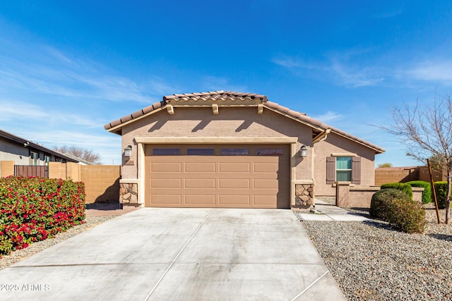 view of front of home with stone siding, fence, and concrete driveway