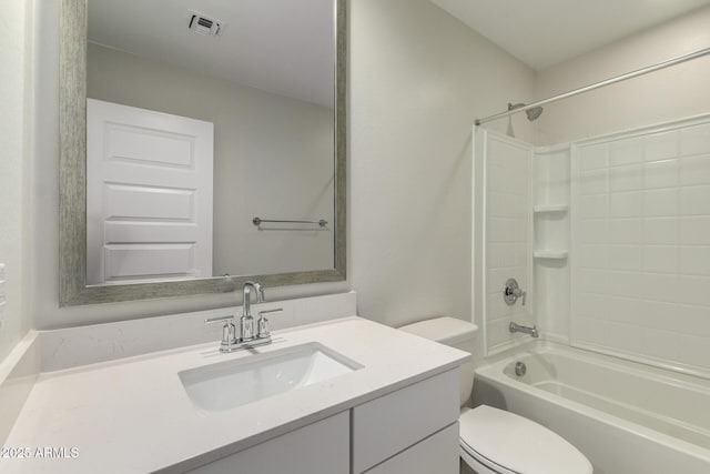 full bathroom featuring toilet, visible vents, shower / washtub combination, and vanity