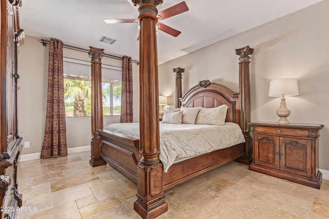 6847 S 27th Pl, Phoenix, AZ 85042 - bedroom featuring stone tile flooring, baseboards, and ceiling fan