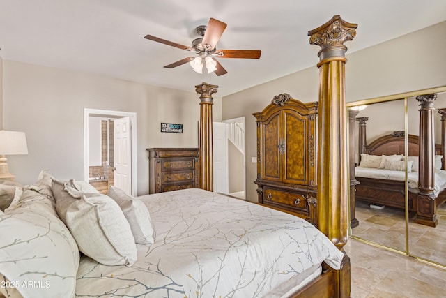 6847 S 27th Pl, Phoenix, AZ 85042 - bedroom featuring a closet, ornate columns, ceiling fan, and ensuite bath