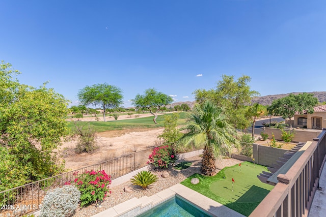 6847 S 27th Pl, Phoenix, AZ 85042 - view of swimming pool with a putting area and a fenced backyard