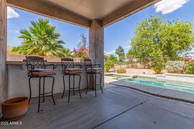 6847 S 27th Pl, Phoenix, AZ 85042 - fenced backyard with a patio and a pool with connected hot tub