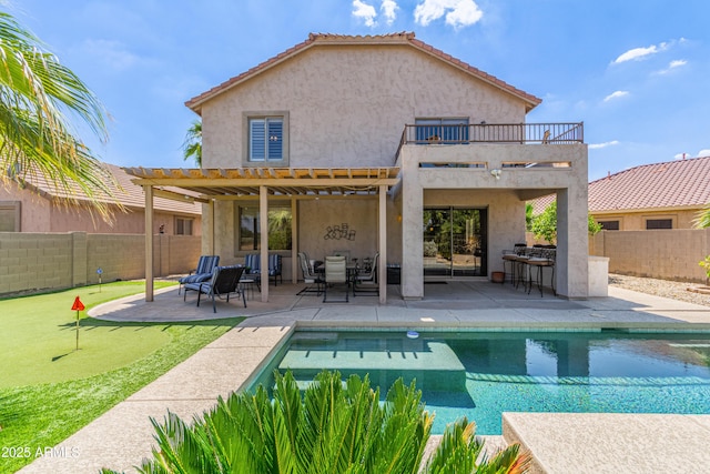 6847 S 27th Pl, Phoenix, AZ 85042 - rear view of property with a balcony, a putting area, a fenced backyard, a pergola, and a patio