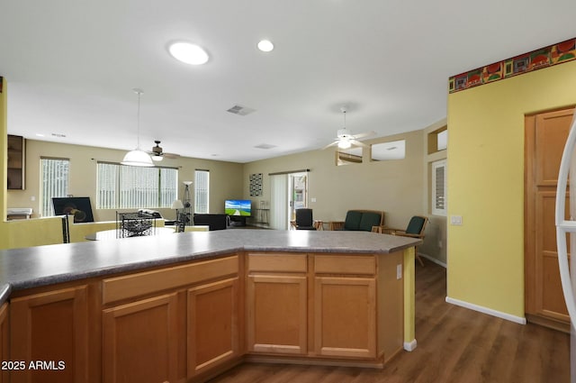 kitchen featuring visible vents, open floor plan, dark wood finished floors, recessed lighting, and ceiling fan