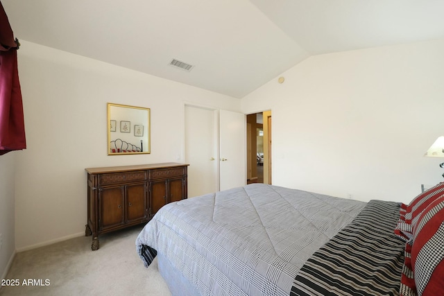 bedroom featuring visible vents, lofted ceiling, light colored carpet, and baseboards