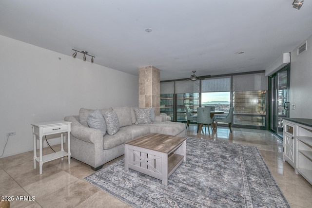 living room with ceiling fan