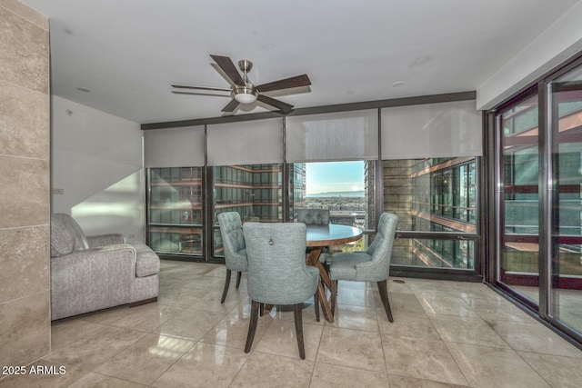 dining area featuring ceiling fan