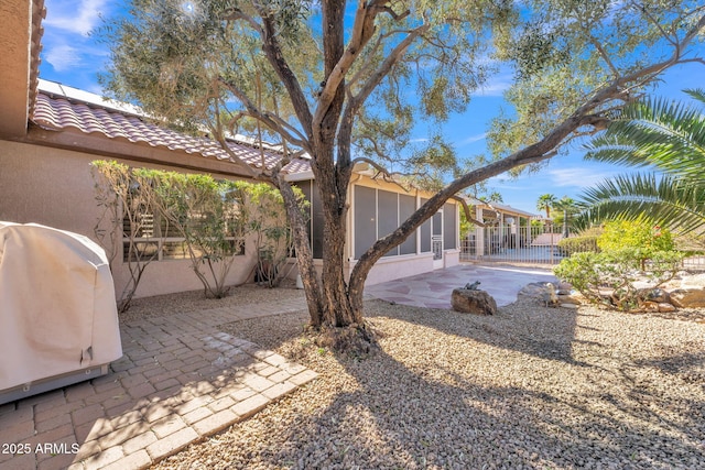 view of yard with a patio area and fence