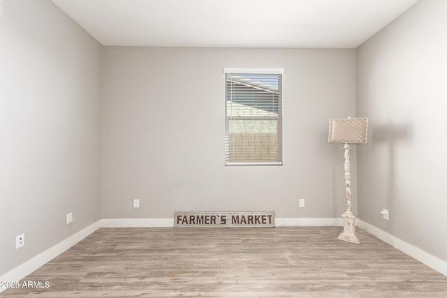 empty room with light wood-type flooring