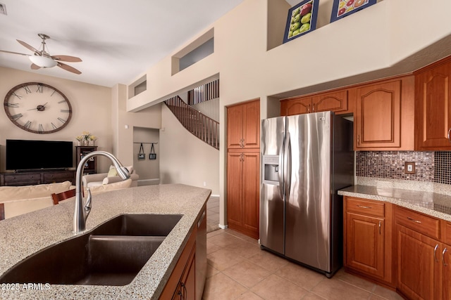 1453 E Elgin Pl, Chandler, AZ 85225 - kitchen with stainless steel refrigerator with ice dispenser, a sink, ceiling fan, tasteful backsplash, and light tile patterned flooring