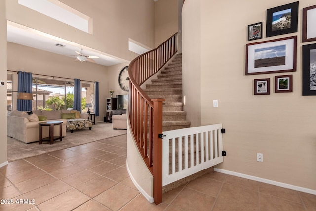 1453 E Elgin Pl, Chandler, AZ 85225 - staircase with tile patterned floors, a towering ceiling, baseboards, and a ceiling fan