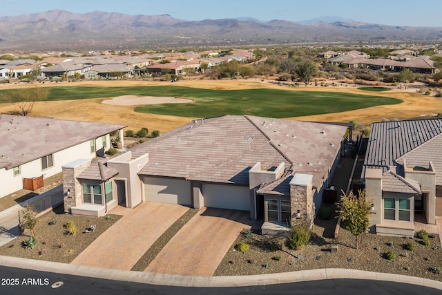 bird's eye view with a mountain view