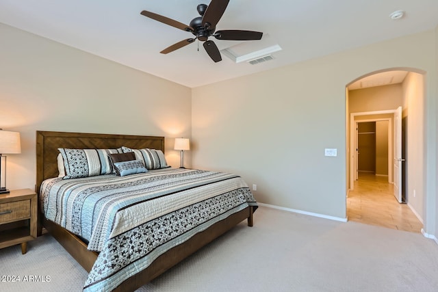 carpeted bedroom with ceiling fan