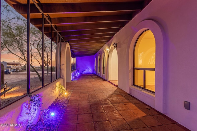 view of patio terrace at dusk