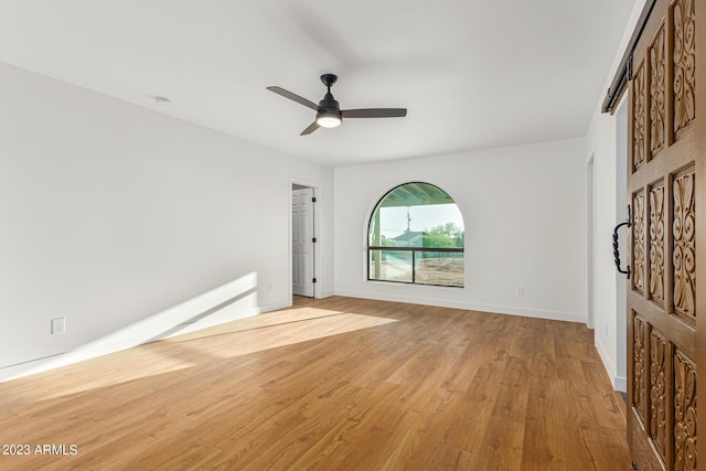 interior space with light wood-type flooring and ceiling fan