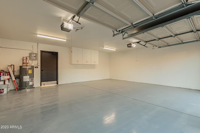 garage with a garage door opener and water heater