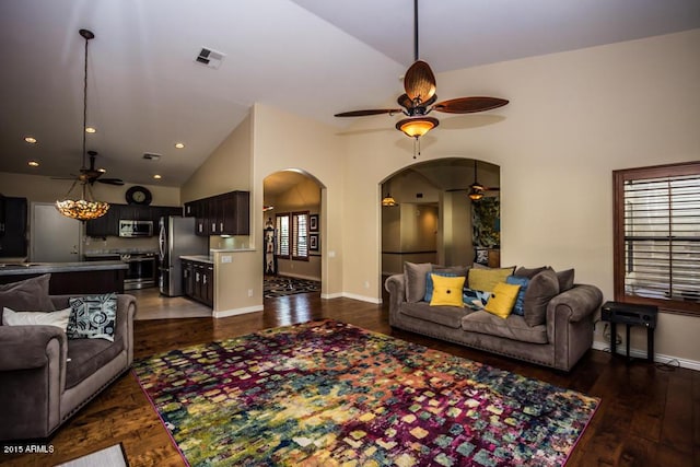 16446 N 59th St, Scottsdale, AZ 85254 - living area featuring visible vents, dark wood finished floors, arched walkways, ceiling fan, and vaulted ceiling