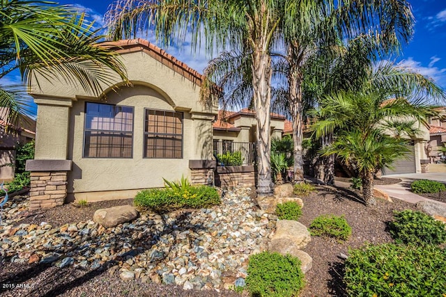 16446 N 59th St, Scottsdale, AZ 85254 - mediterranean / spanish home with stucco siding and a tile roof