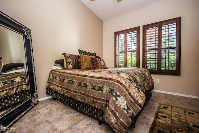 16446 N 59th St, Scottsdale, AZ 85254 - bedroom featuring baseboards and lofted ceiling