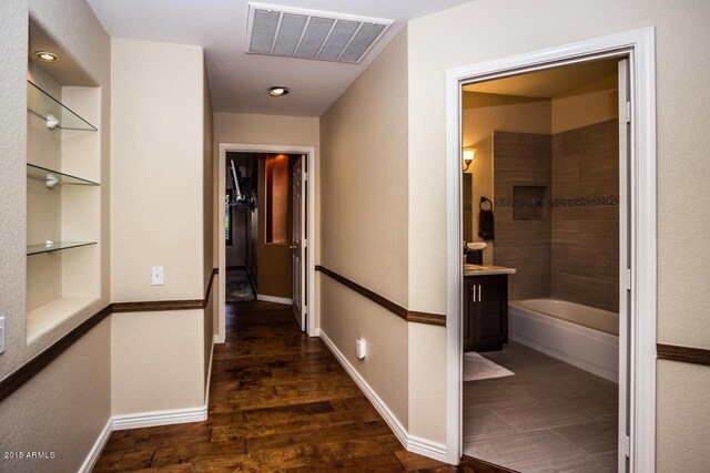 16446 N 59th St, Scottsdale, AZ 85254 - hall featuring visible vents, baseboards, and wood finished floors