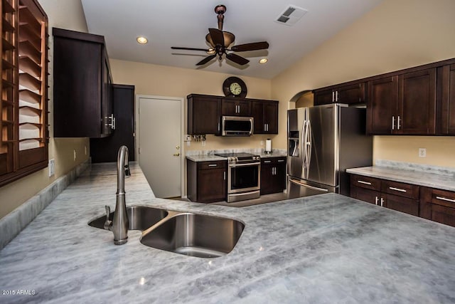 16446 N 59th St, Scottsdale, AZ 85254 - kitchen featuring visible vents, a ceiling fan, a sink, stainless steel appliances, and vaulted ceiling