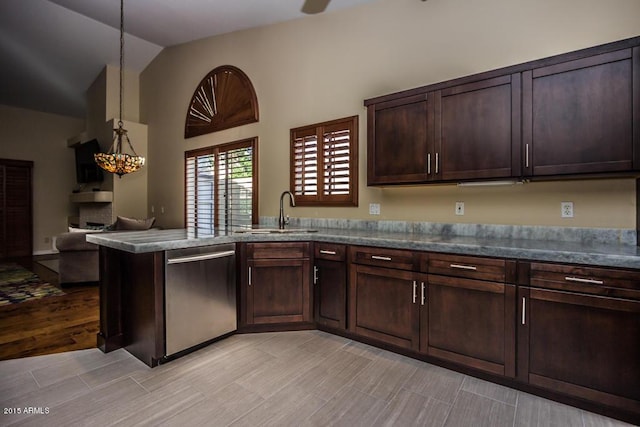 16446 N 59th St, Scottsdale, AZ 85254 - kitchen with dark brown cabinets, open floor plan, vaulted ceiling, stainless steel dishwasher, and a sink