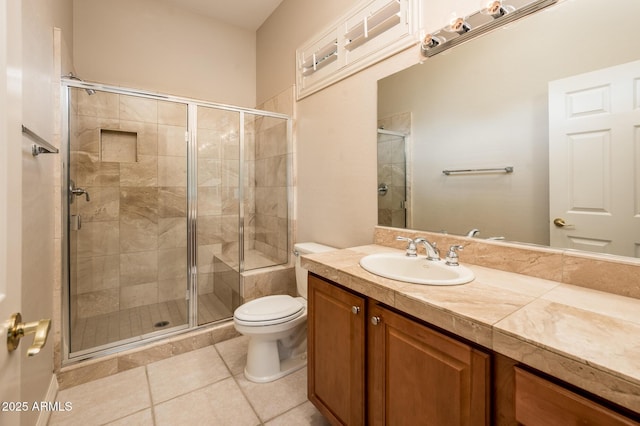 full bathroom with a stall shower, tile patterned flooring, vanity, and toilet