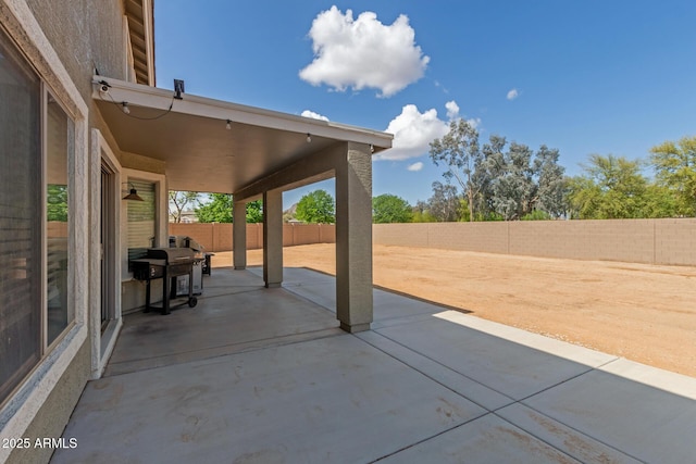 view of patio / terrace featuring a fenced backyard and area for grilling