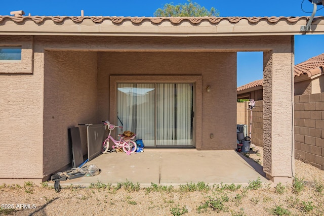 7310 N 68th Ln, Glendale, AZ 85303 - rear view of house with a patio area and stucco siding