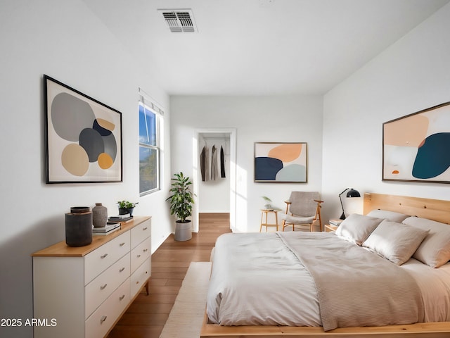 bedroom with hardwood / wood-style floors