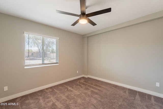 4001 E Apollo Rd, Phoenix, AZ 85042 - unfurnished room featuring dark colored carpet and a ceiling fan