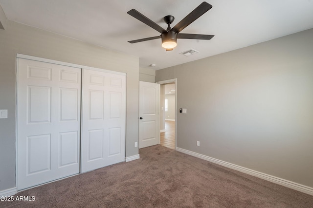 4001 E Apollo Rd, Phoenix, AZ 85042 - unfurnished bedroom featuring carpet floors, a closet, and ceiling fan