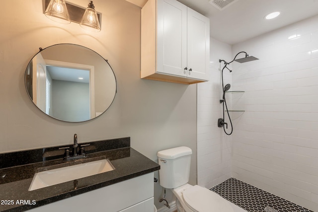 4001 E Apollo Rd, Phoenix, AZ 85042 - full bathroom featuring a tile shower, vanity, and recessed lighting