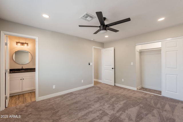 4001 E Apollo Rd, Phoenix, AZ 85042 - unfurnished bedroom with light colored carpet, recessed lighting, connected bathroom, a closet, and ceiling fan