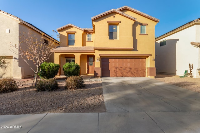 view of front of property featuring a garage