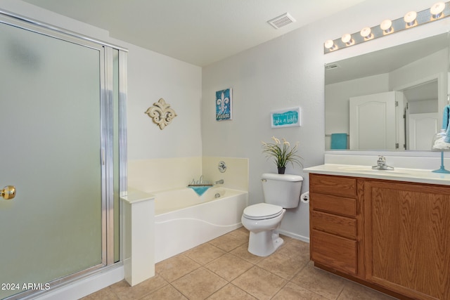 full bathroom with tile patterned flooring, vanity, toilet, and independent shower and bath