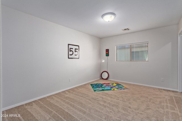 recreation room with carpet floors