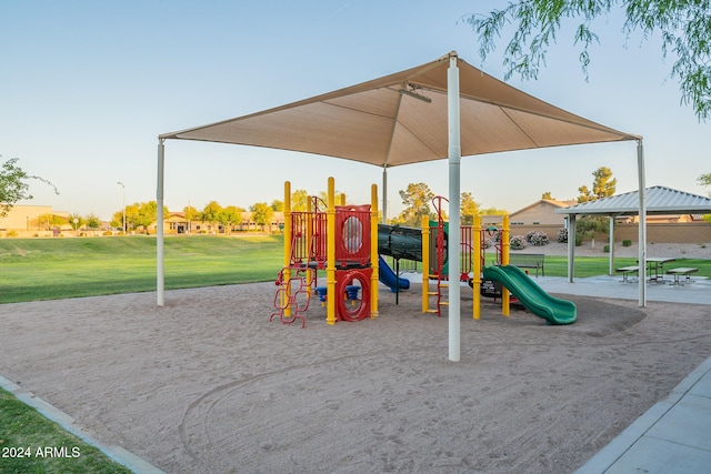 view of jungle gym with a gazebo and a yard