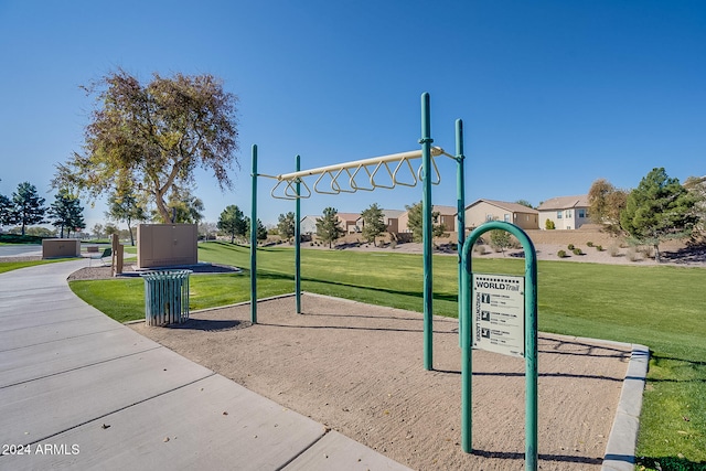 view of property's community with a yard