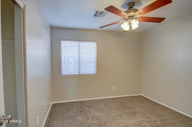 carpeted empty room with ceiling fan