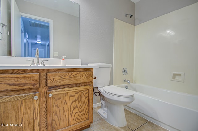 full bathroom featuring tile patterned floors, vanity, shower / bath combination, and toilet