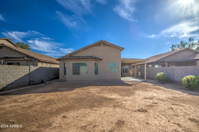 rear view of house with a patio