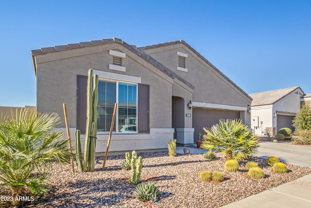 view of front of property with a garage