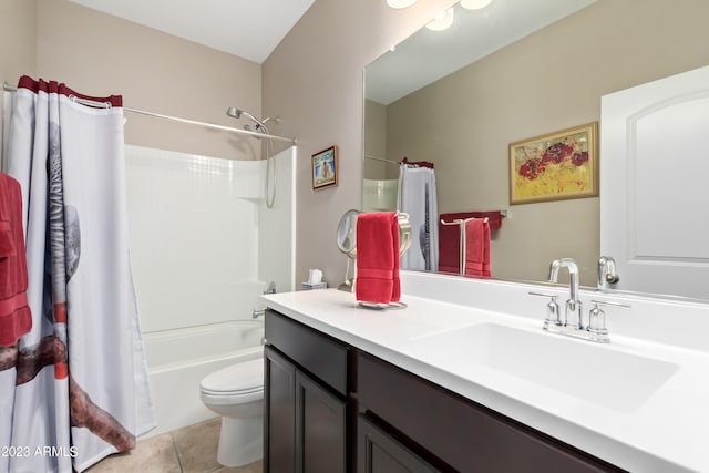 full bathroom with toilet, tile patterned floors, vanity, and shower / tub combo with curtain