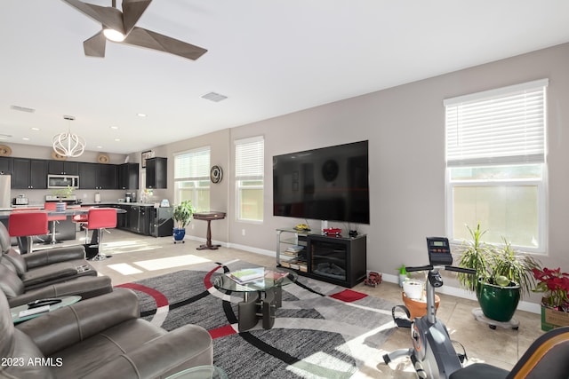 living room with ceiling fan