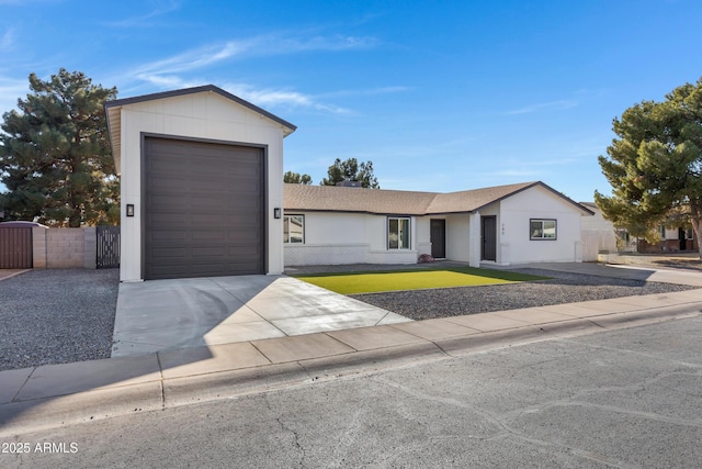 ranch-style house featuring a garage