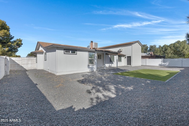 back of house featuring a patio