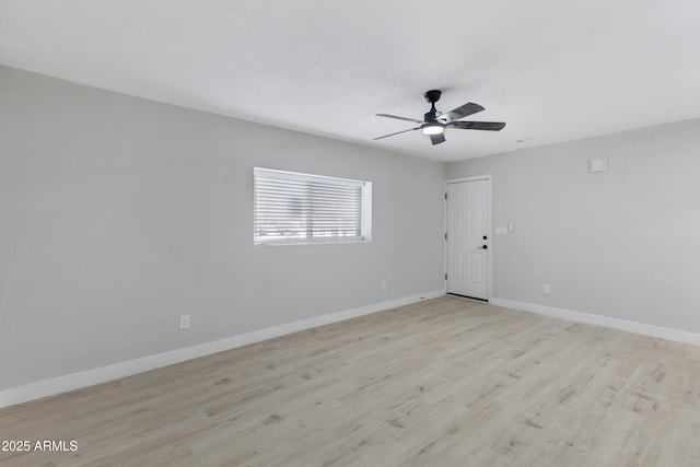 unfurnished room featuring ceiling fan and light hardwood / wood-style floors