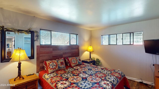 bedroom featuring hardwood / wood-style flooring